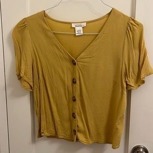 Yellow/chartreuse colored top with tortoise buttons